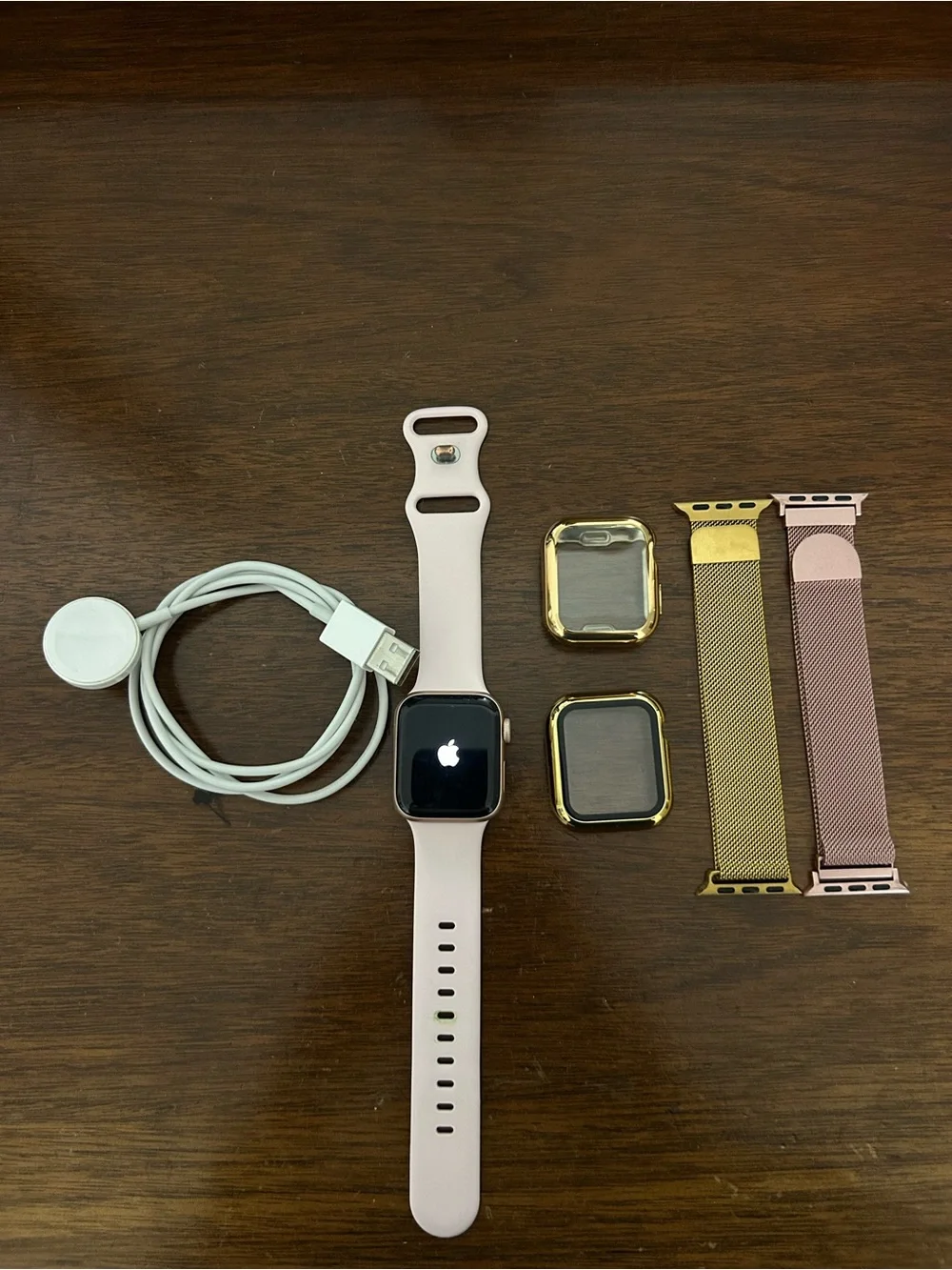 Apple Watch SE (Rose Gold) with Pink Sport Band and Gold Bands and Accessories